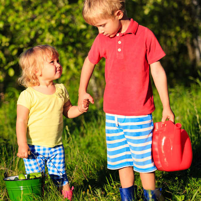 brother sister supportive in the garden